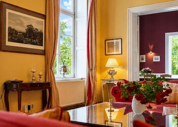 Foto: PapadoXX-Fotografie Dirk Poxdoerfer - Ferienwohnung Herrenhauswohnung elegantes Wohnzimmer