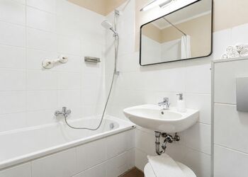 Photo: PapadoXX-Fotografie Dirk Poxdoerfer – Kaminwohnung holiday flat bathroom