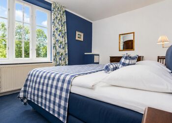 Photo: PapadoXX-Fotografie Dirk Poxdoerfer – Fuchsbau holiday flat bedroom with a view from the window