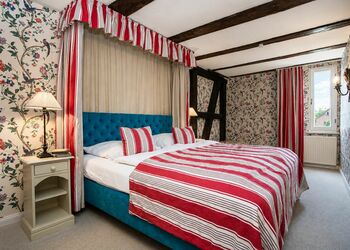 Photo: PapadoXX-Fotografie Dirk Poxdoerfer – Gänsestall holiday flat a cosy bedroom