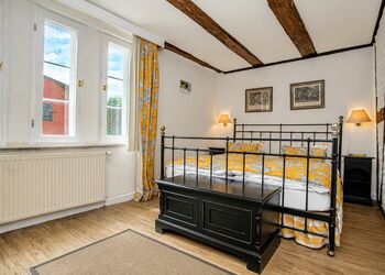 Foto: PapadoXX-Fotografie Dirk Poxdoerfer - Ferienwohnung Storchennest Bett