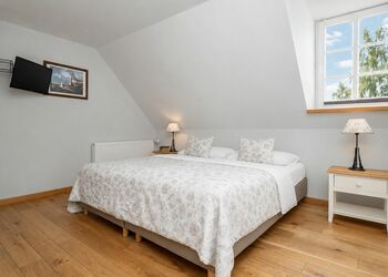 Photo: PapadoXX-Fotografie Dirk Poxdoerfer – Terrassenblick holiday flat scandinavian-style bedroom