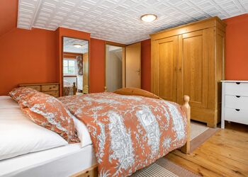 Photo: PapadoXX-Fotografie Dirk Poxdoerfer – Haus Mai holiday home bedroom