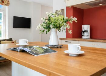 Photo: PapadoXX-Fotografie Dirk Poxdoerfer – Terrassenblick holiday flat kitchen