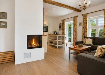 Photo: PapadoXX-Fotografie Dirk Poxdoerfer – Terrassenblick holiday flat country-style with a fireplace