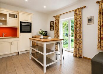 Photo: PapadoXX-Fotografie Dirk Poxdoerfer – Terrassenblick holiday flat kitchen