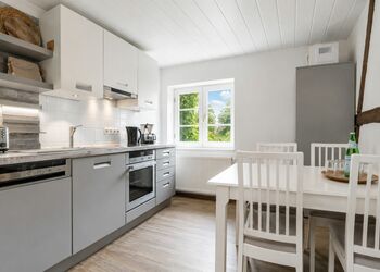 Photo: PapadoXX-Fotografie Dirk Poxdoerfer – Gänsestall holiday flat modern kitchen